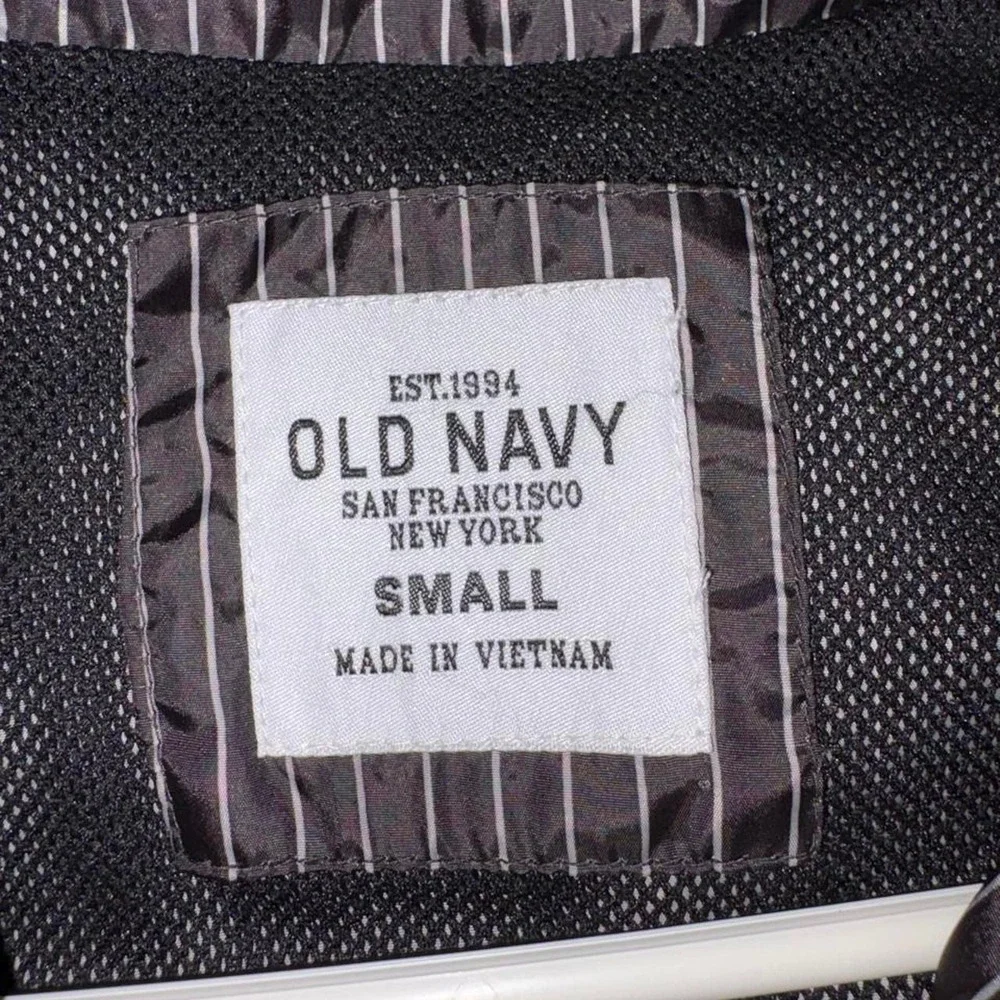 Old Navy black with white vertical pinstripe windbreaker jacket in a small